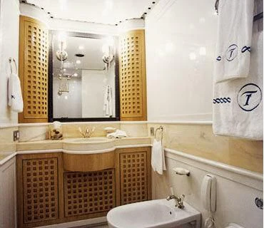 a bathroom with a sink and a mirror aboard TUEQ Yacht for Sale