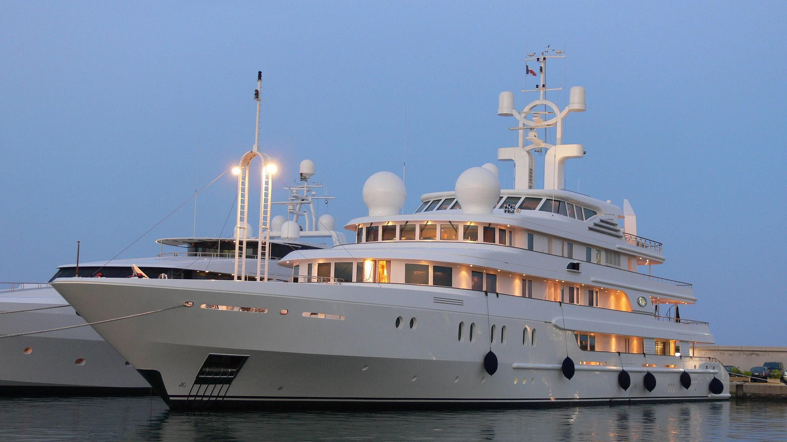 a large white ship aboard TUEQ Yacht for Sale