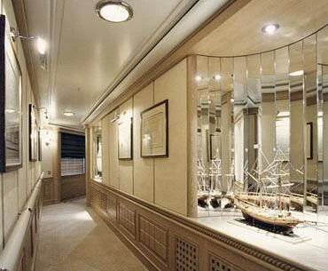 a large room with a large mirror aboard TUEQ Yacht for Sale