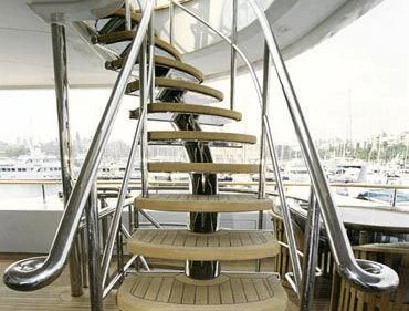 a metal structure with metal railings aboard TUEQ Yacht for Sale