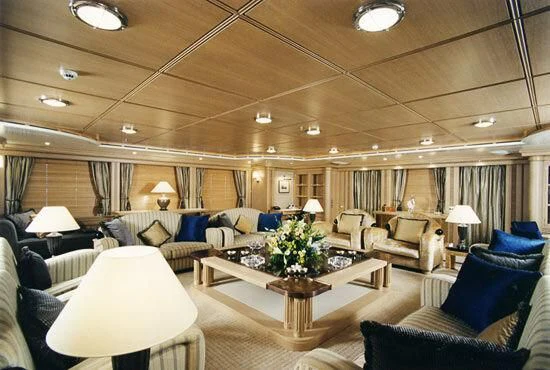 a living room with a large window aboard TUEQ Yacht for Sale