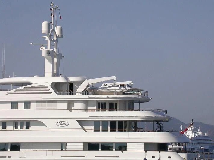 a large white boat aboard TUEQ Yacht for Sale