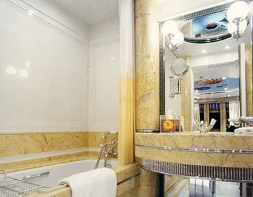 a bathroom with a large mirror aboard TUEQ Yacht for Sale