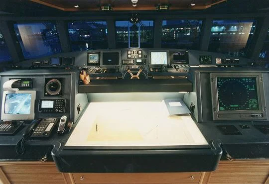 a room with computers and monitors aboard TUEQ Yacht for Sale