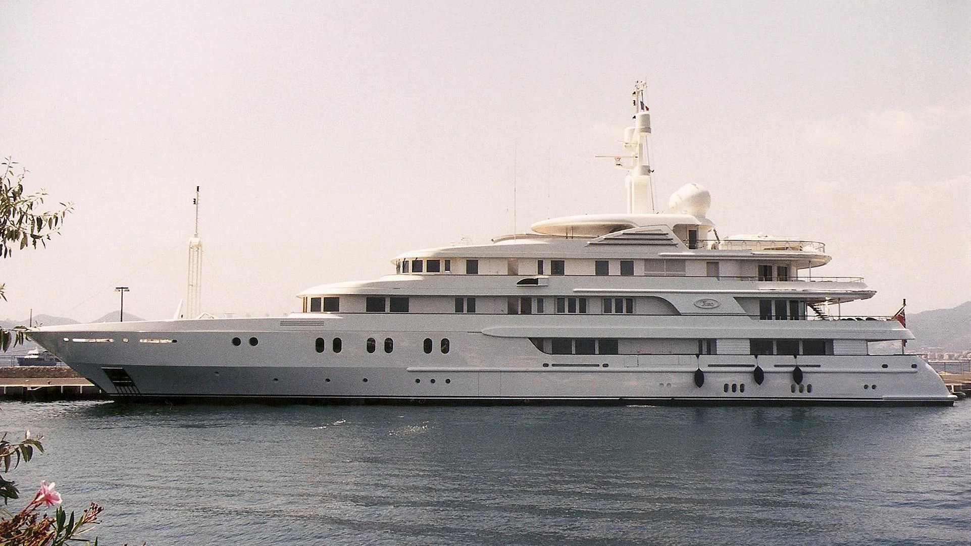 a large white ship aboard TUEQ Yacht for Sale