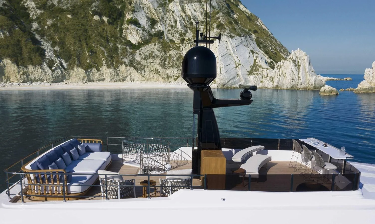 a lifeguard stand on a beach aboard UPSTREAM Yacht for Sale
