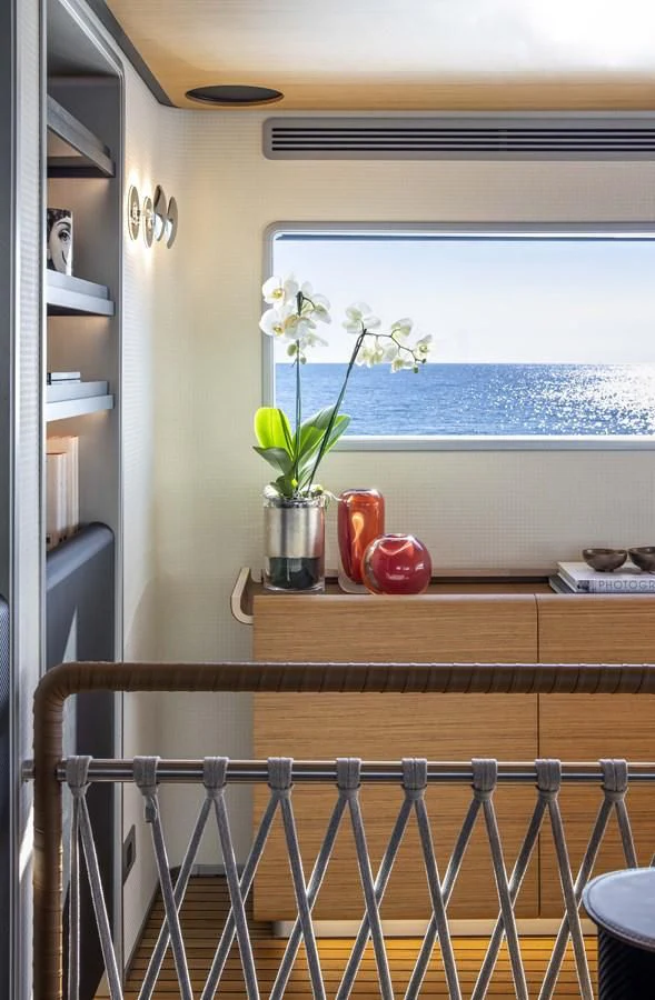 a window with a plant on it aboard UPSTREAM Yacht for Sale