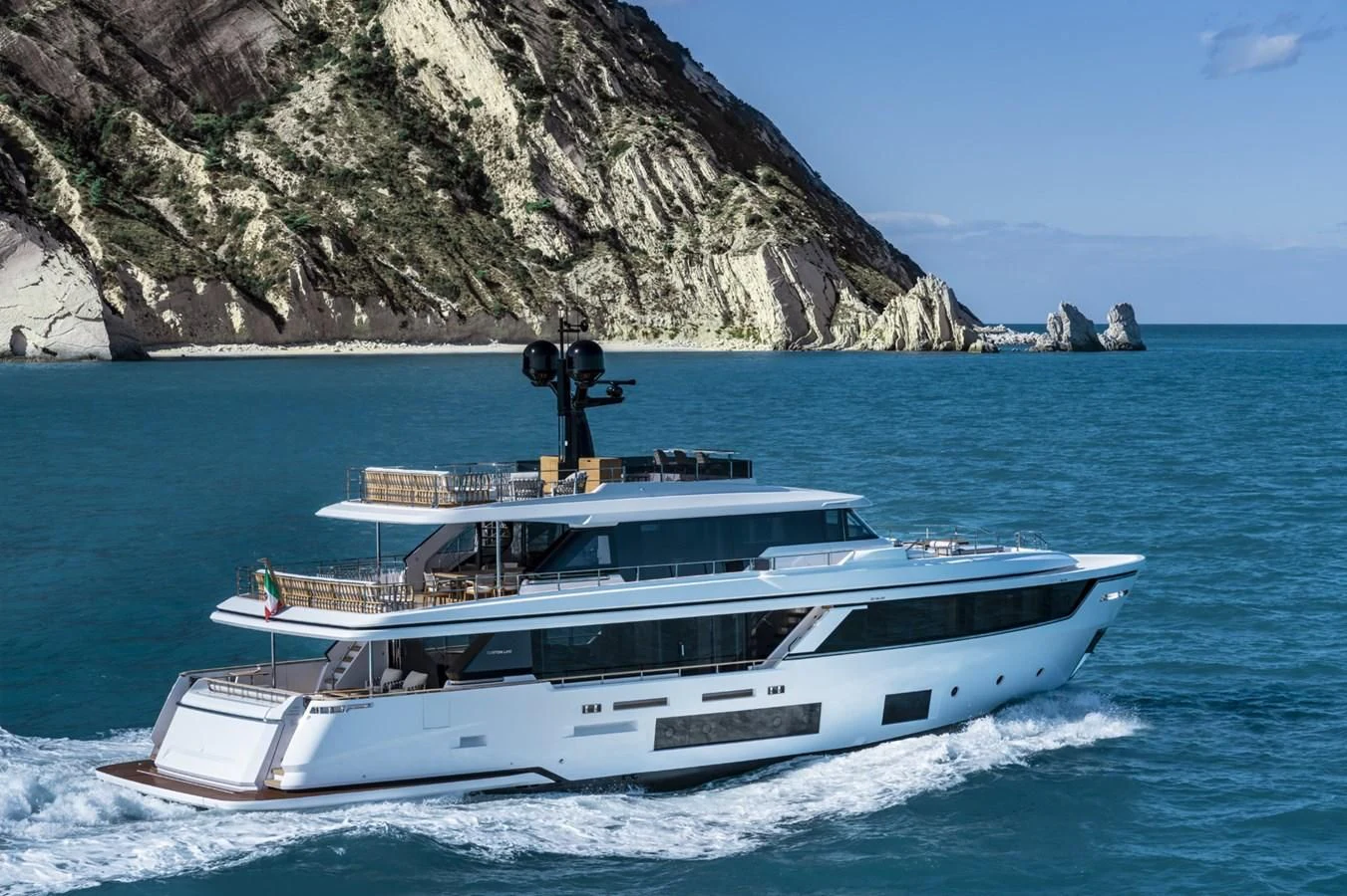 a white yacht on the water aboard UPSTREAM Yacht for Sale