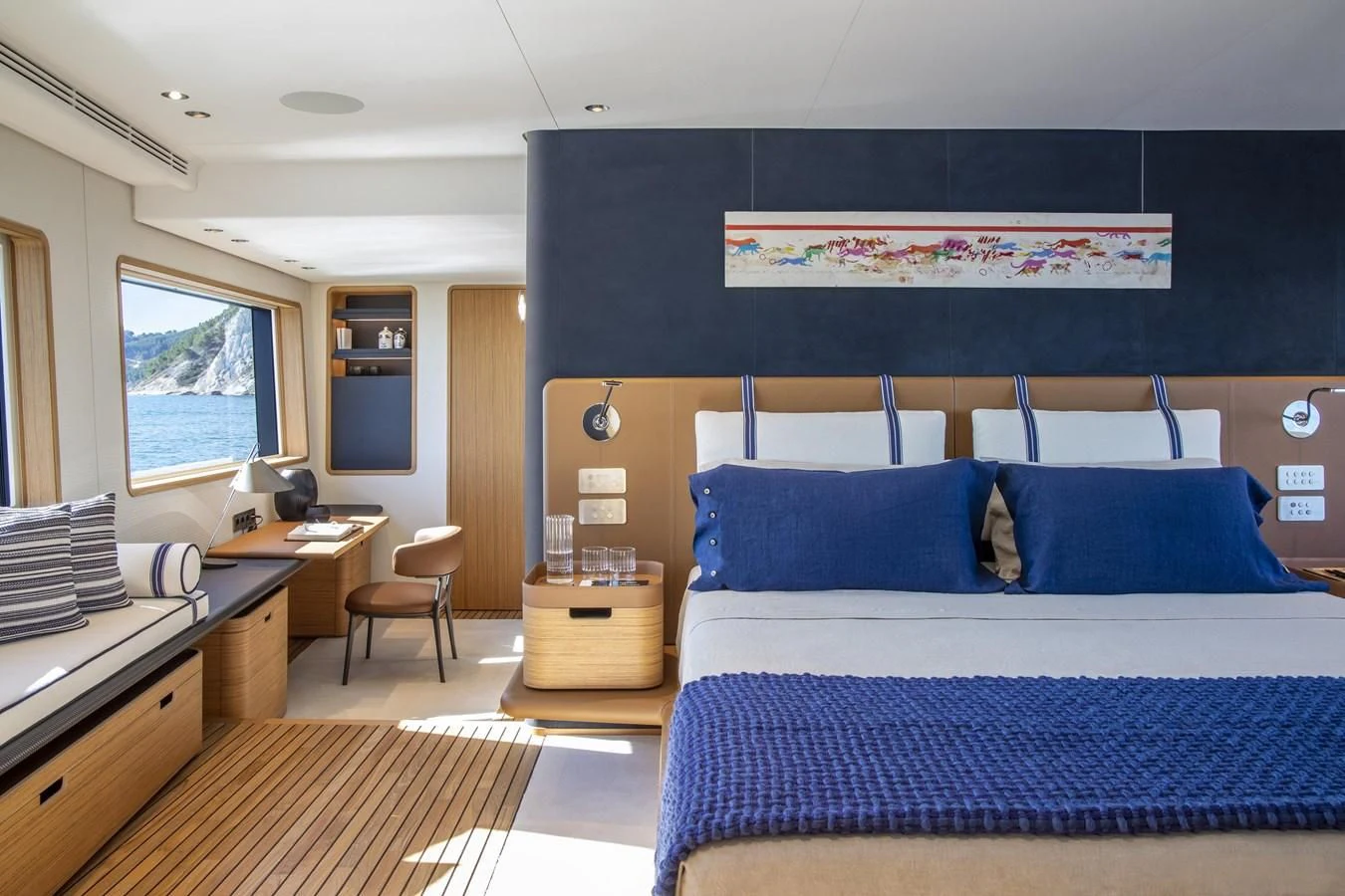 a bedroom with two beds aboard UPSTREAM Yacht for Sale
