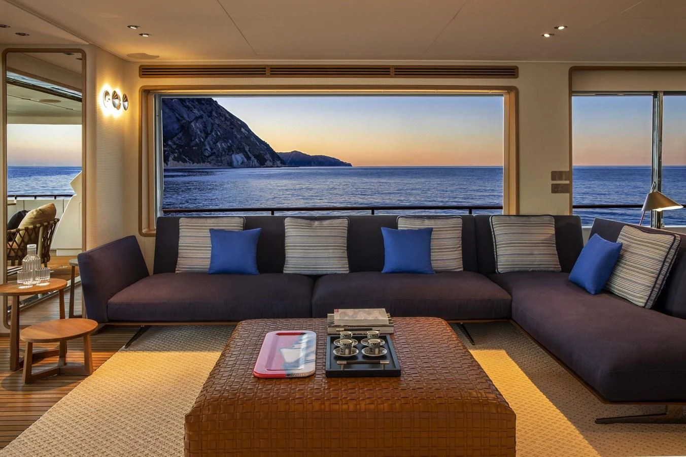 a living room with a large window aboard UPSTREAM Yacht for Sale