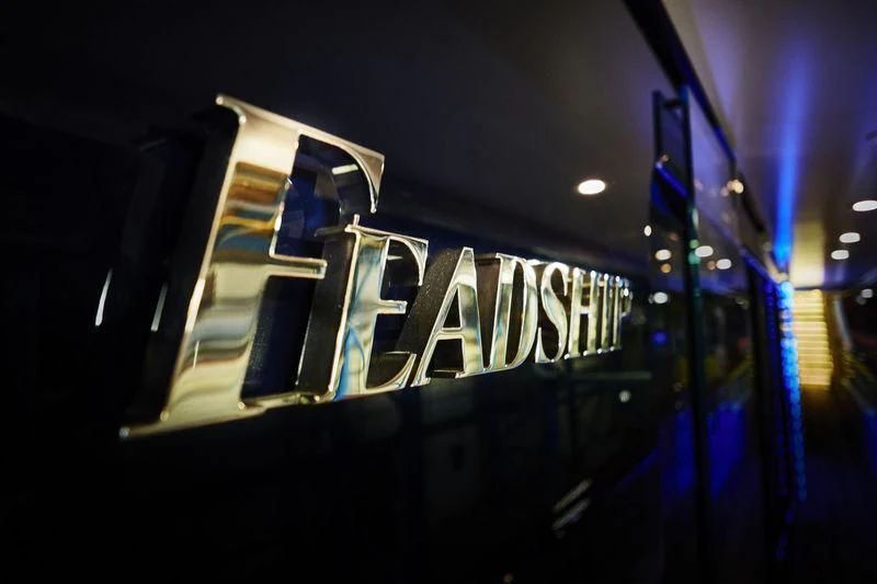 a building with a sign on the side aboard HAMPSHIRE Yacht for Sale