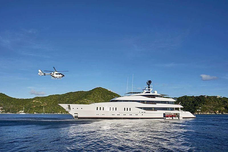 a helicopter flying over a boat aboard HAMPSHIRE Yacht for Sale