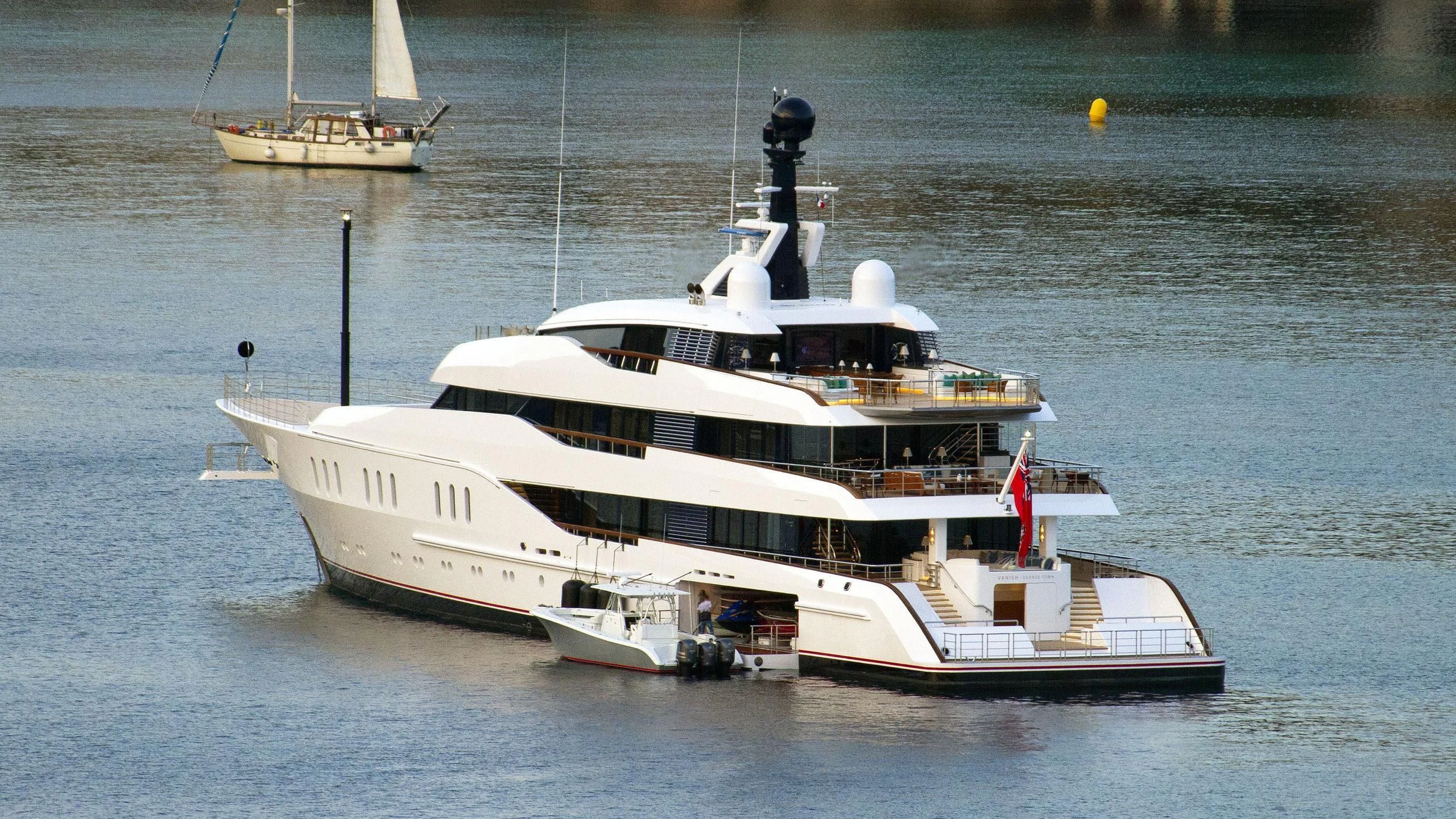 a large white boat with a smaller boat on it aboard HAMPSHIRE Yacht for Sale