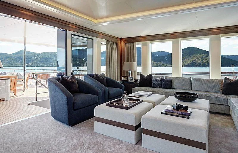 a living room with a large window aboard HAMPSHIRE Yacht for Sale