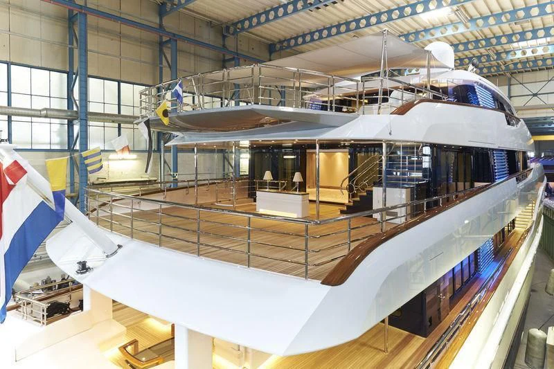 a large white airplane in a building aboard HAMPSHIRE Yacht for Sale