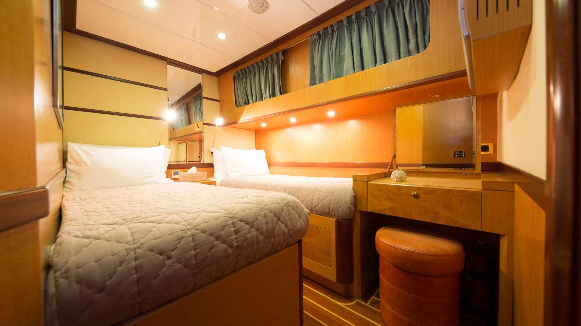 a room with two beds aboard SERENITY 86 Yacht for Charter