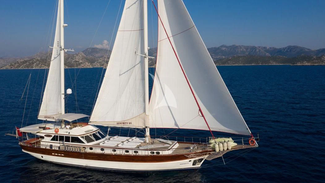 a sailboat on the water aboard SERENITY 86 Yacht for Charter