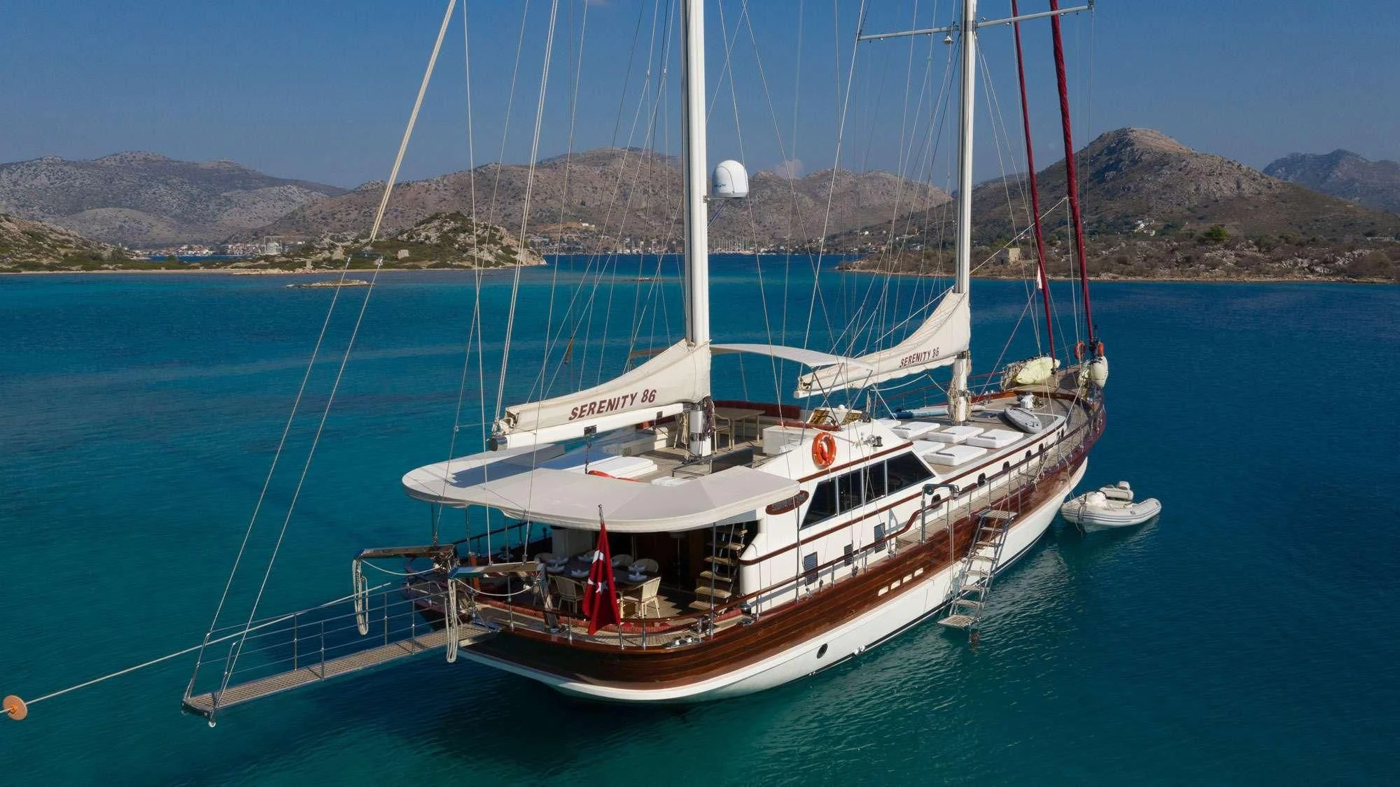 a boat in the water aboard SERENITY 86 Yacht for Charter