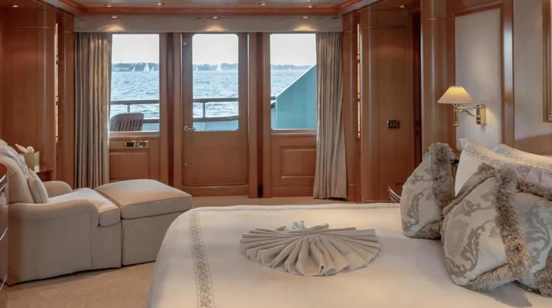 a bed in a room aboard LAUREL Yacht for Charter