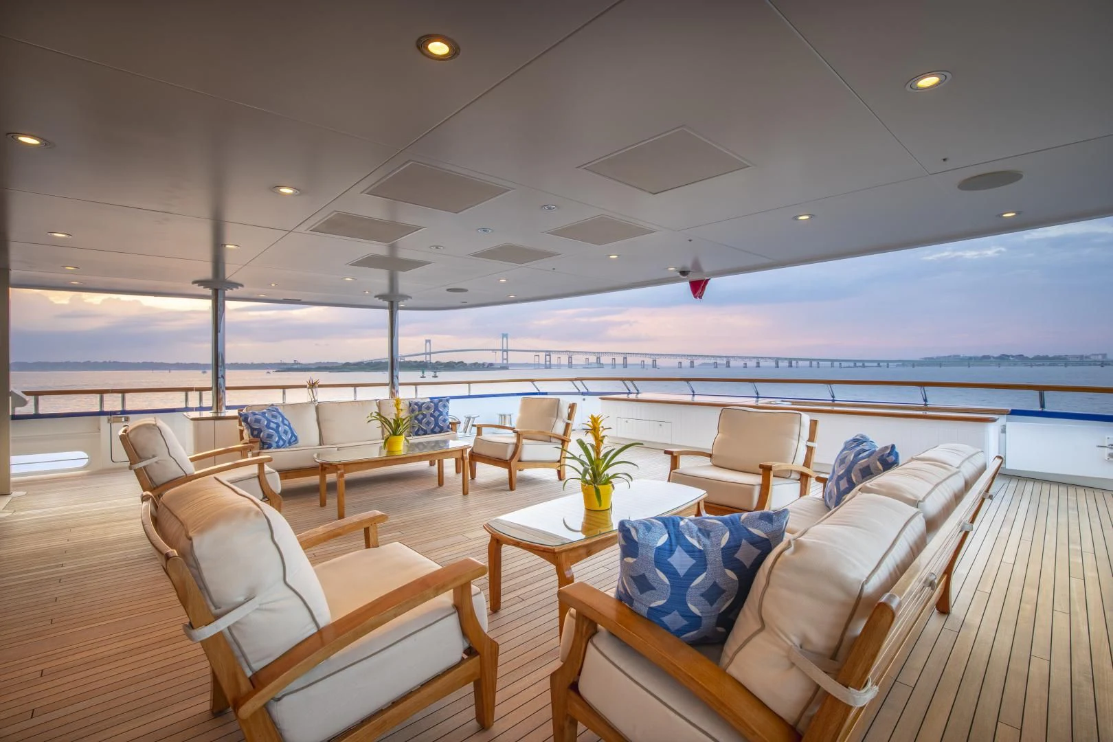 a large cruise ship with a deck aboard LAUREL Yacht for Charter