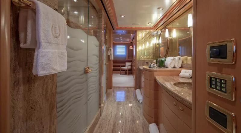 a bathroom with a shower and sink aboard LAUREL Yacht for Charter