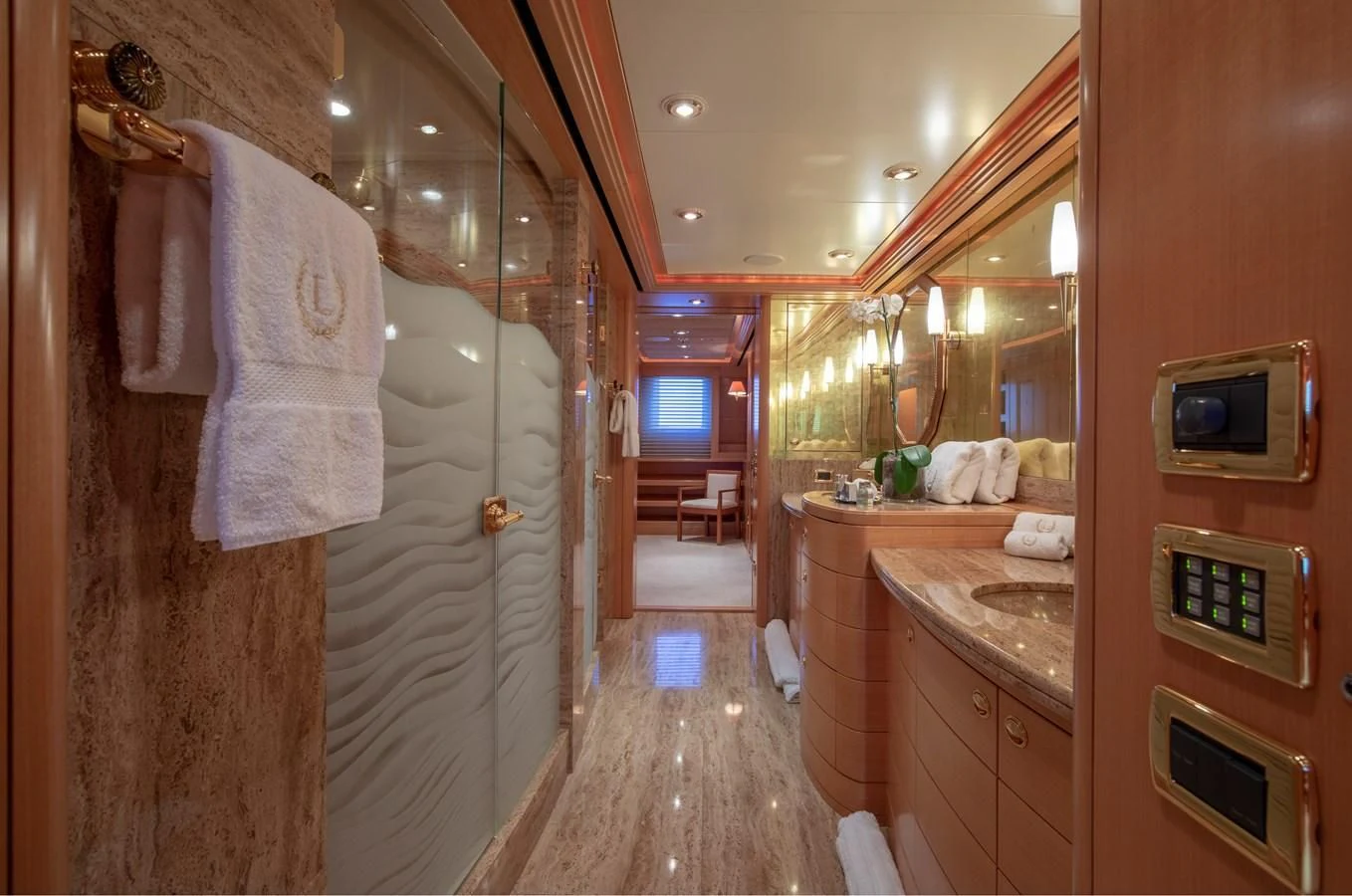 a bathroom with a shower and a sink aboard LAUREL Yacht for Charter