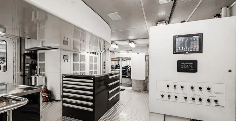 a room with a large machine aboard LAUREL Yacht for Charter