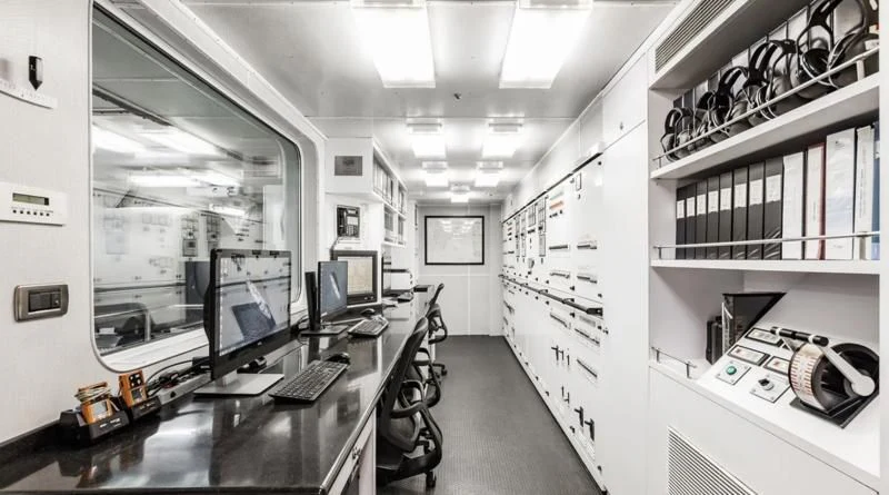 a room with computers and equipment aboard LAUREL Yacht for Charter