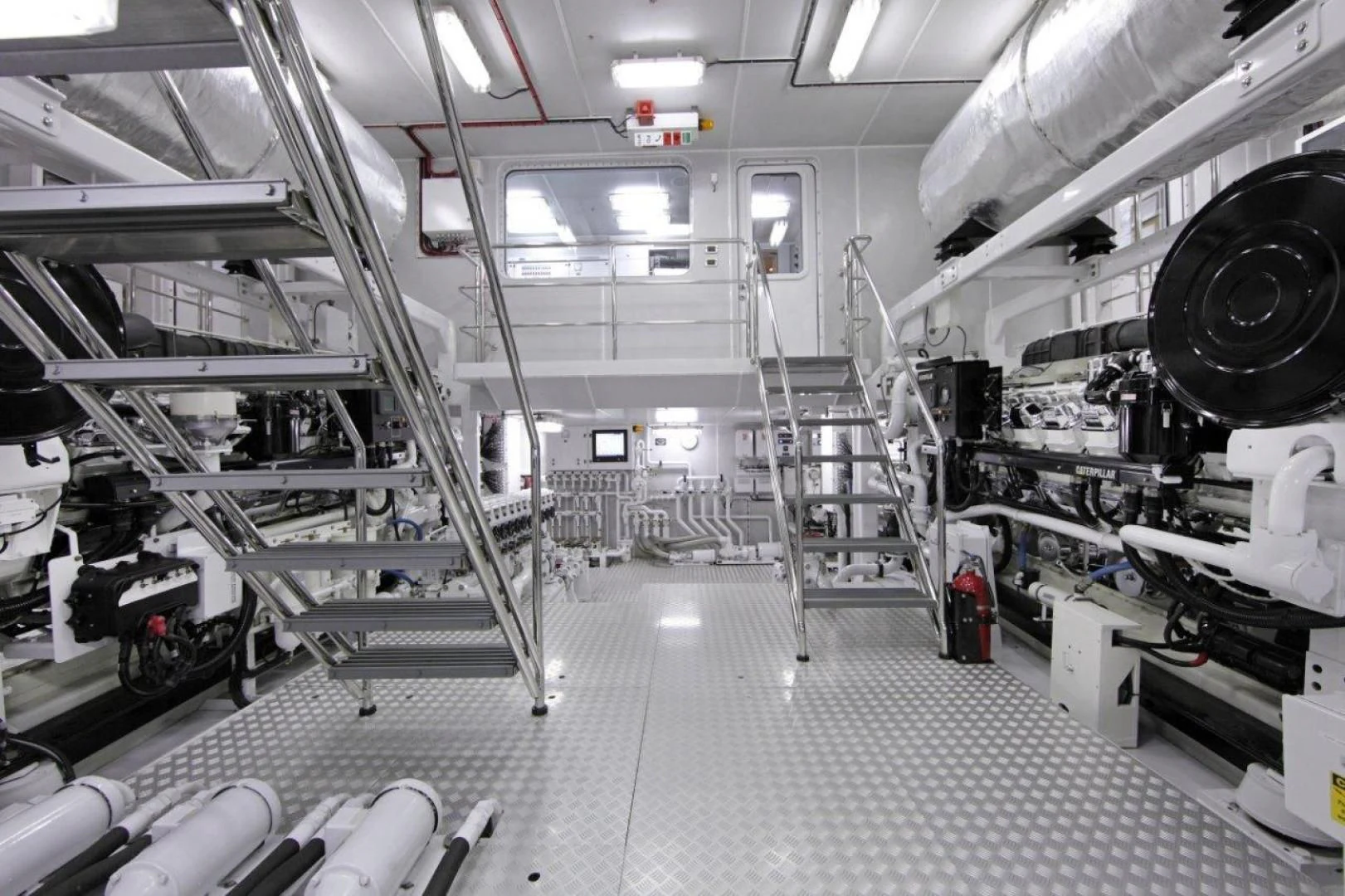 a room with large machines aboard LAUREL Yacht for Charter