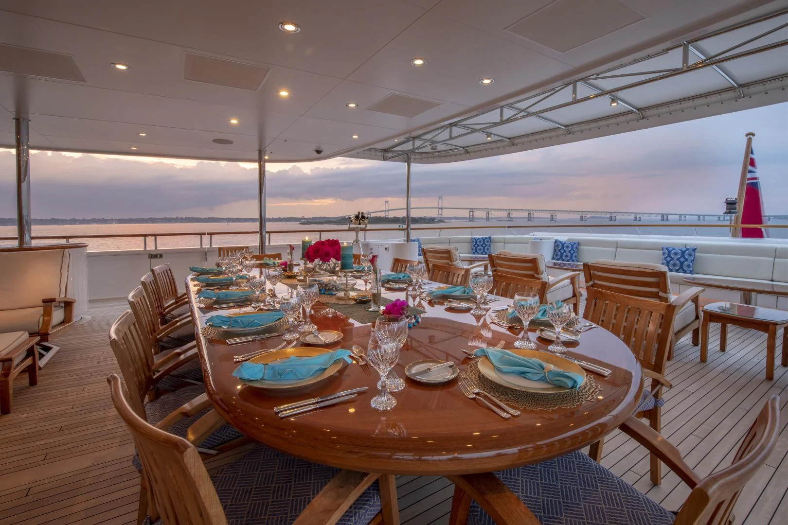 a table set for a dinner party aboard LAUREL Yacht for Charter