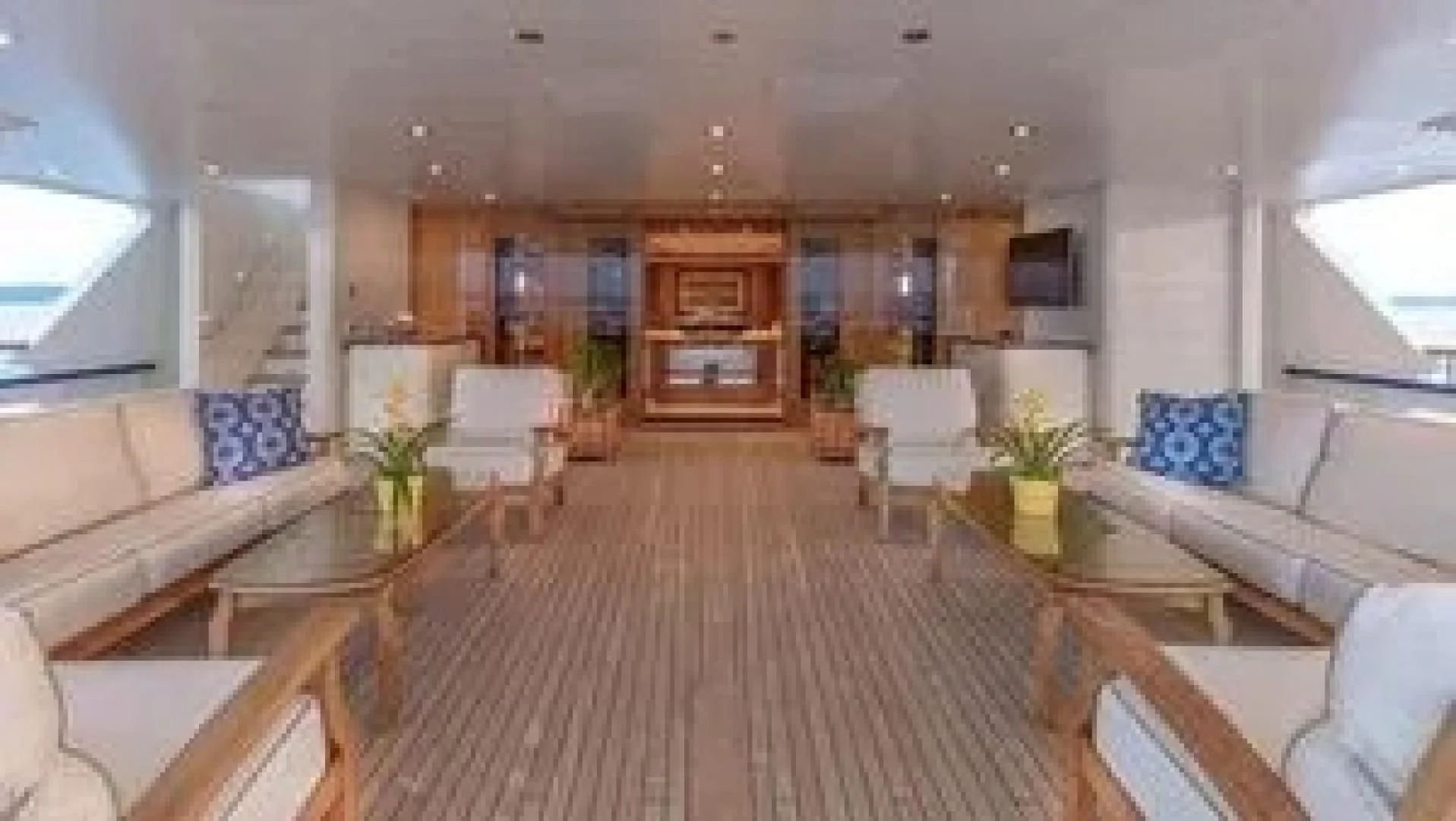 a living room with a wood floor aboard LAUREL Yacht for Charter
