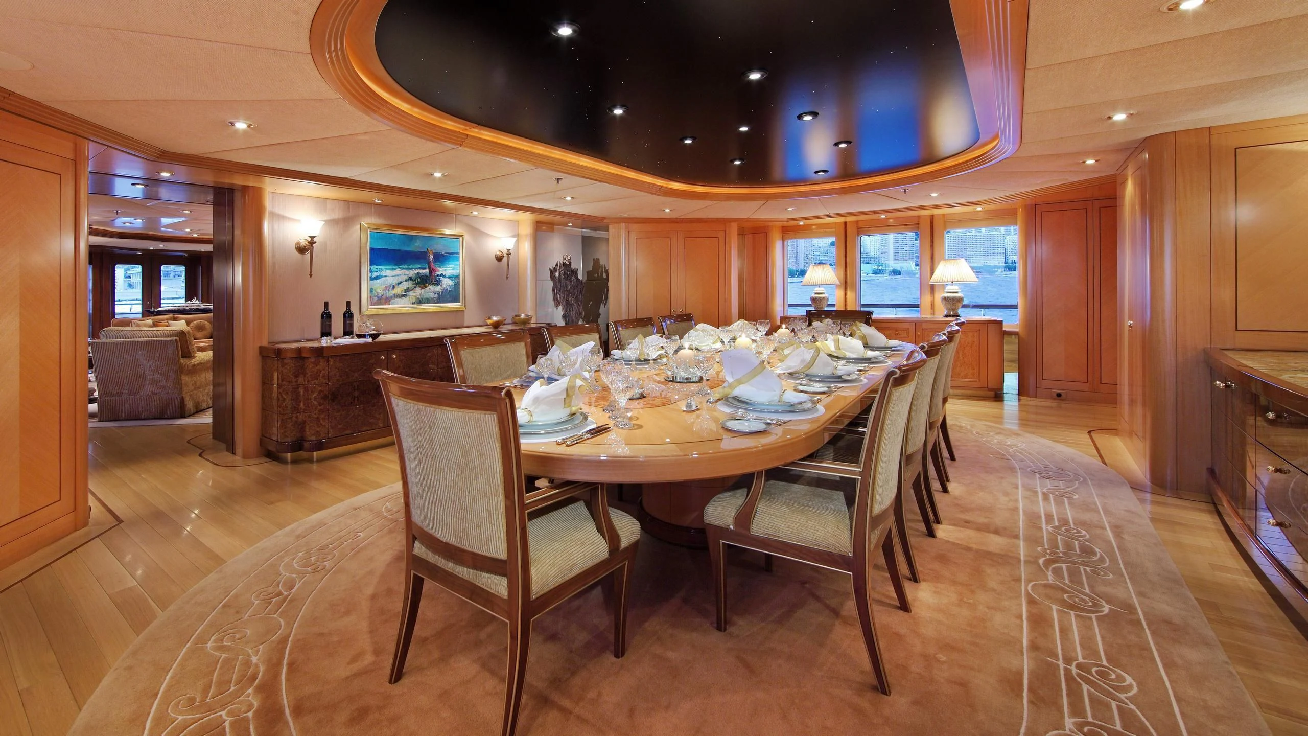 a large kitchen with a dining table aboard LAUREL Yacht for Charter