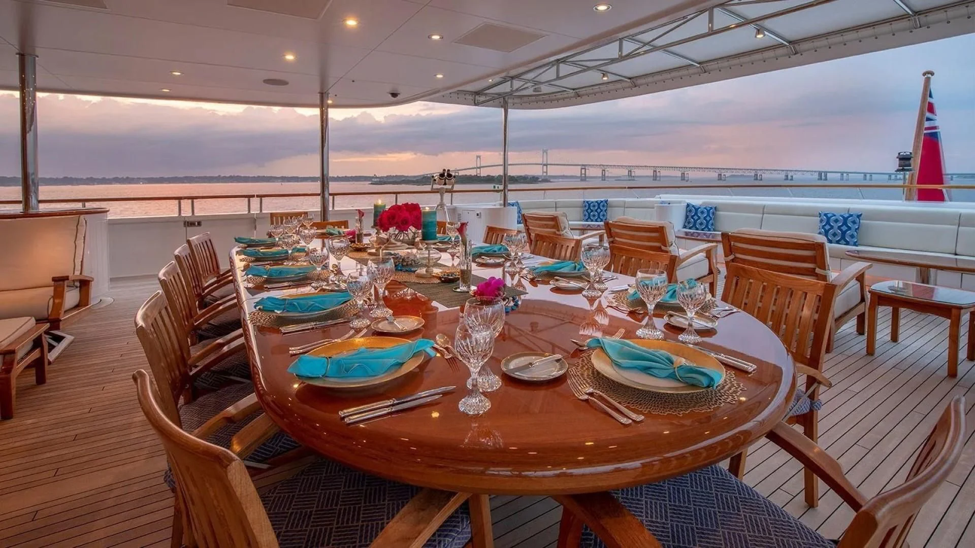 a table set for a dinner party aboard LAUREL Yacht for Charter