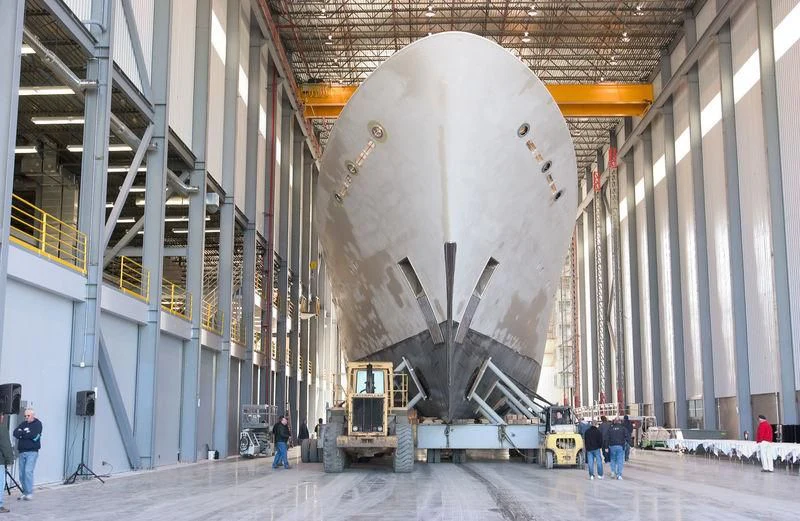 a large white machine in a factory aboard LAUREL Yacht for Charter