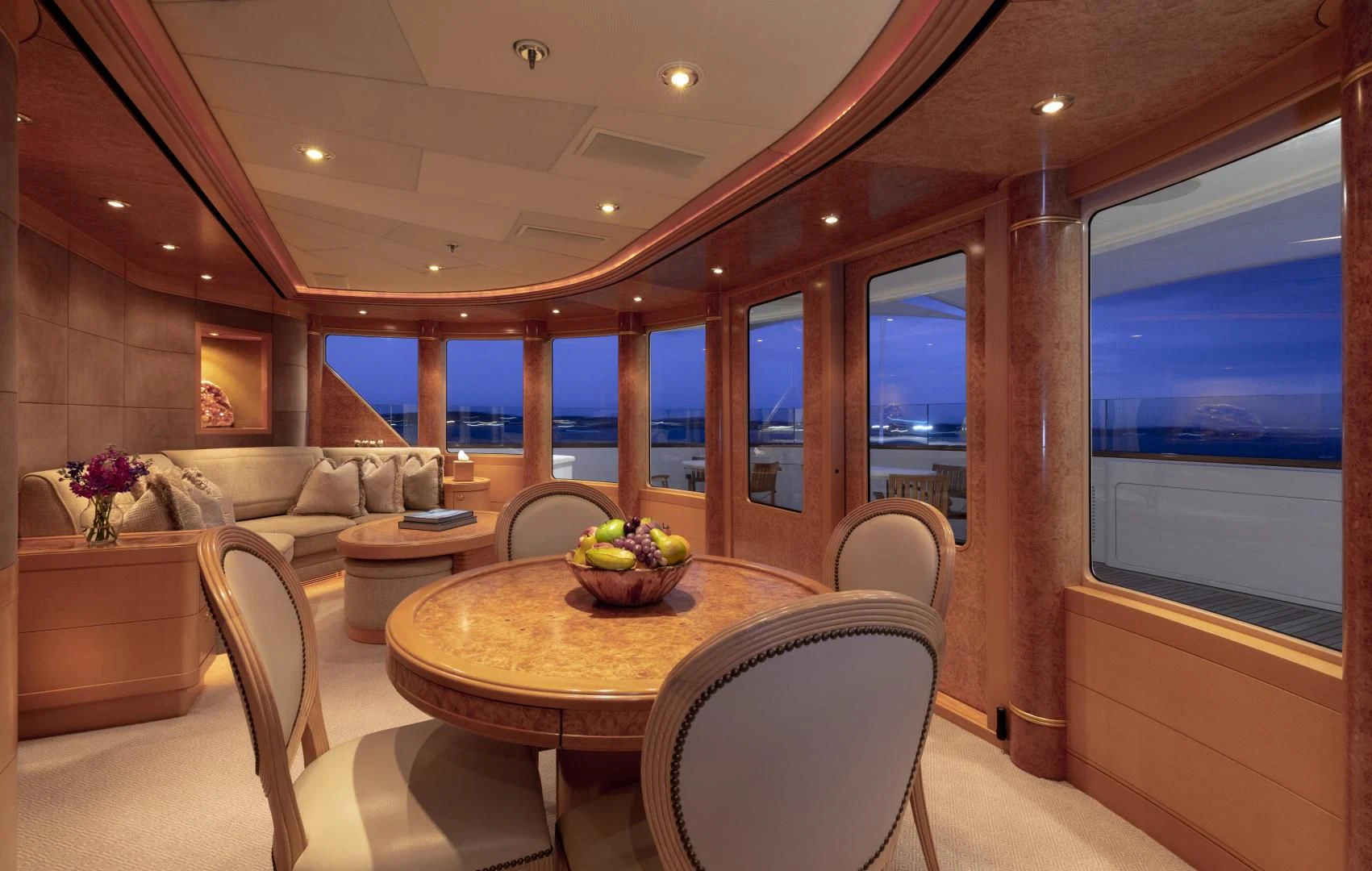 a room with a table and chairs aboard LAUREL Yacht for Charter