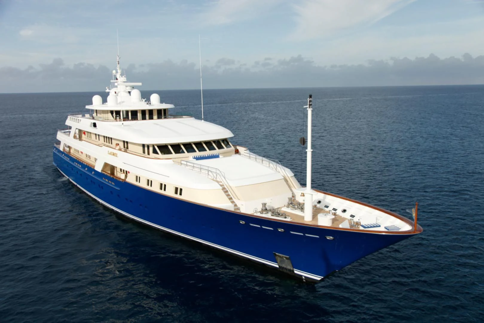 a large white boat in the water aboard LAUREL Yacht for Charter