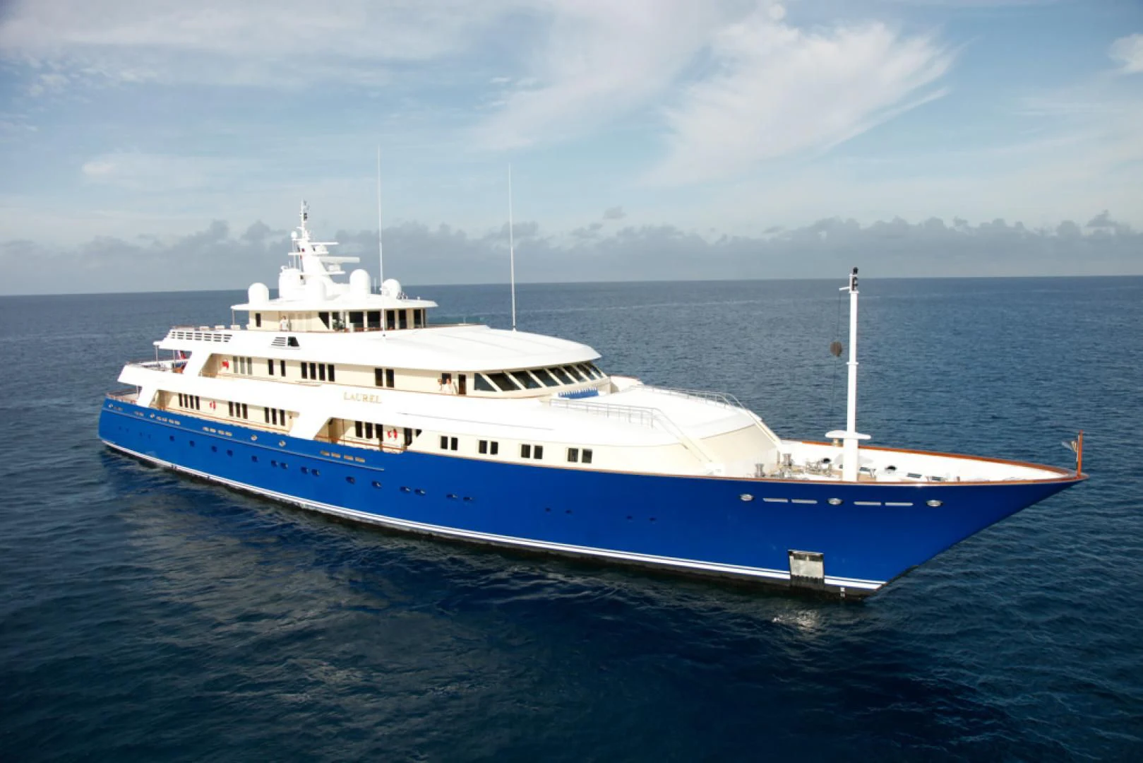 a large white boat in the water aboard LAUREL Yacht for Charter