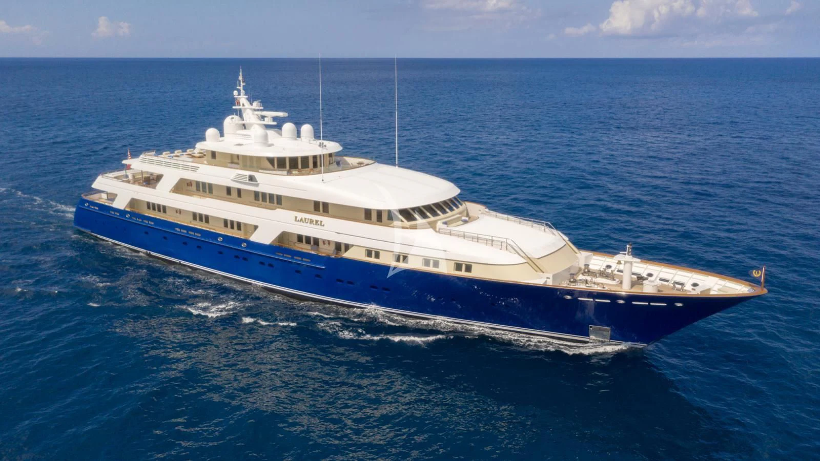 a large white ship in the water aboard LAUREL Yacht for Charter