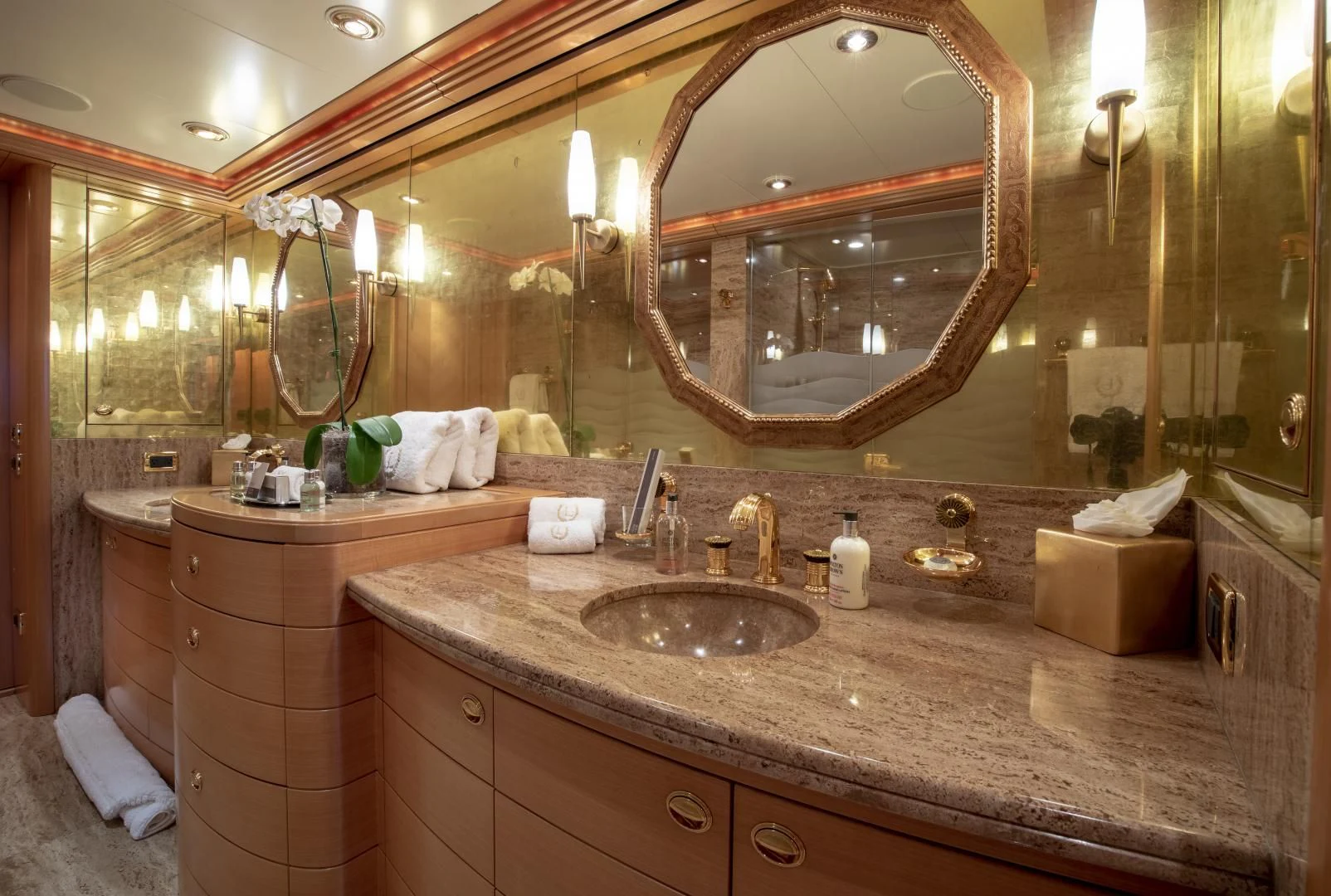 a bathroom with a large mirror aboard LAUREL Yacht for Charter