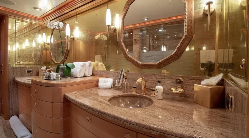 a bathroom with a large mirror aboard LAUREL Yacht for Charter