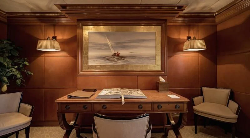 a room with a table and chairs aboard LAUREL Yacht for Charter