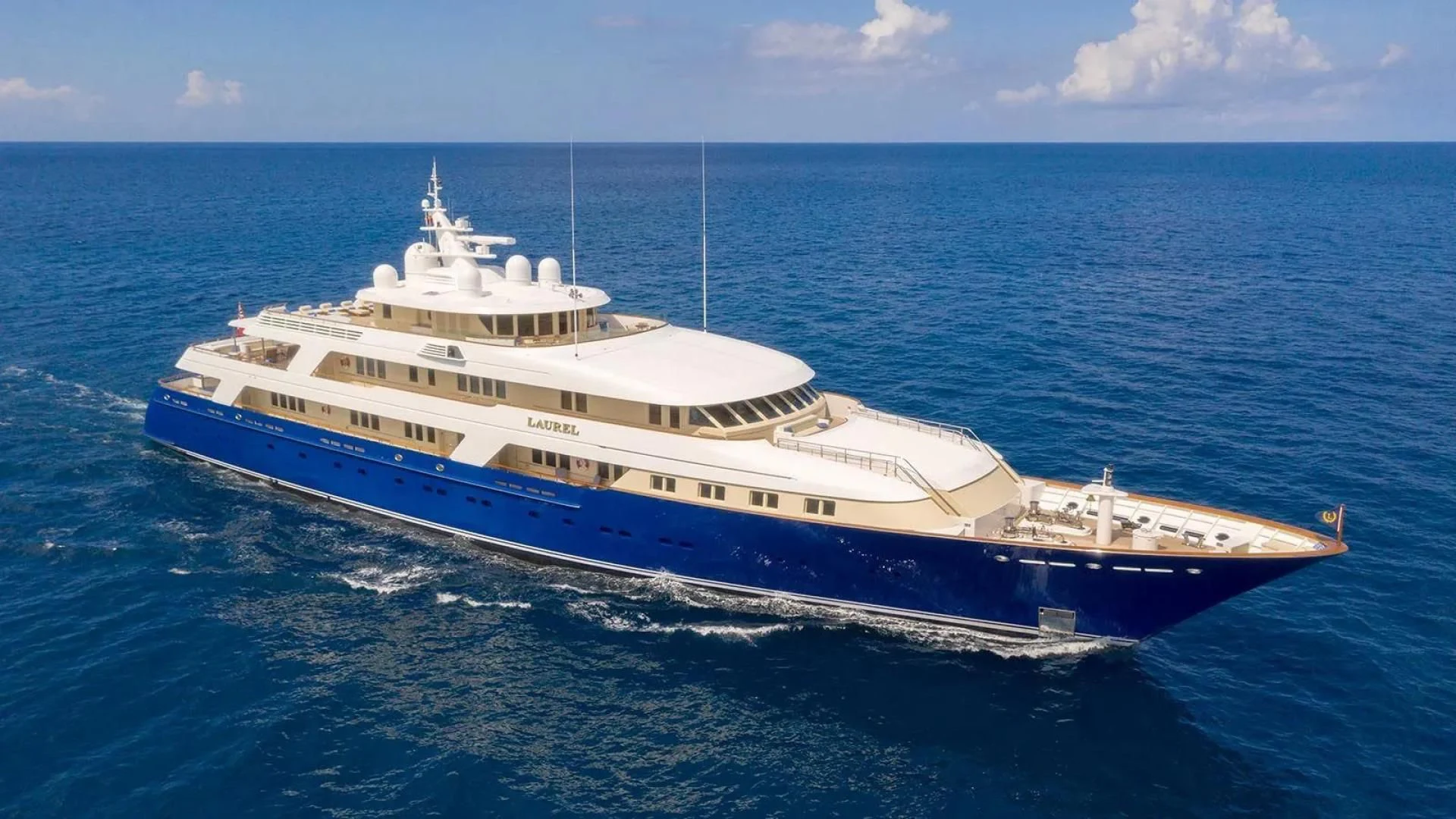 a large white ship in the water aboard LAUREL Yacht for Charter