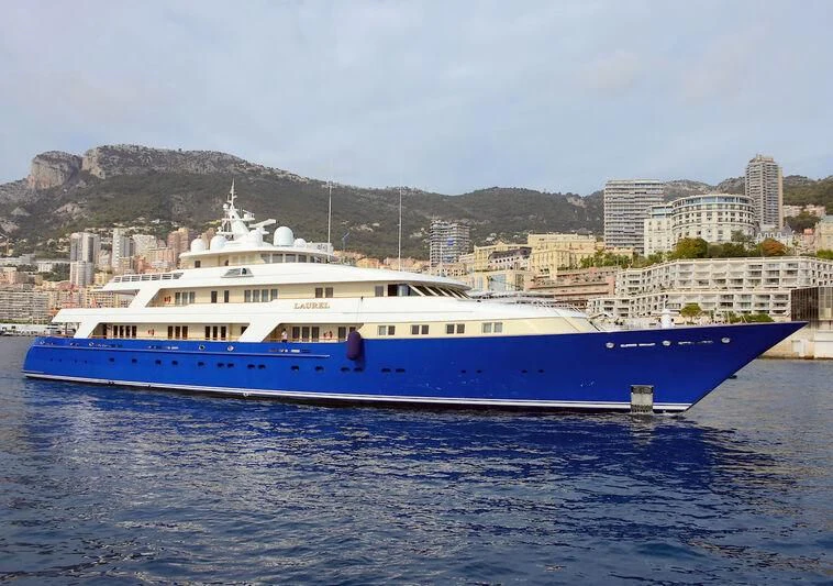 a large white boat in the water aboard LAUREL Yacht for Charter