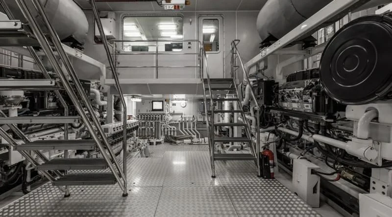 a large factory with large machinery aboard LAUREL Yacht for Charter