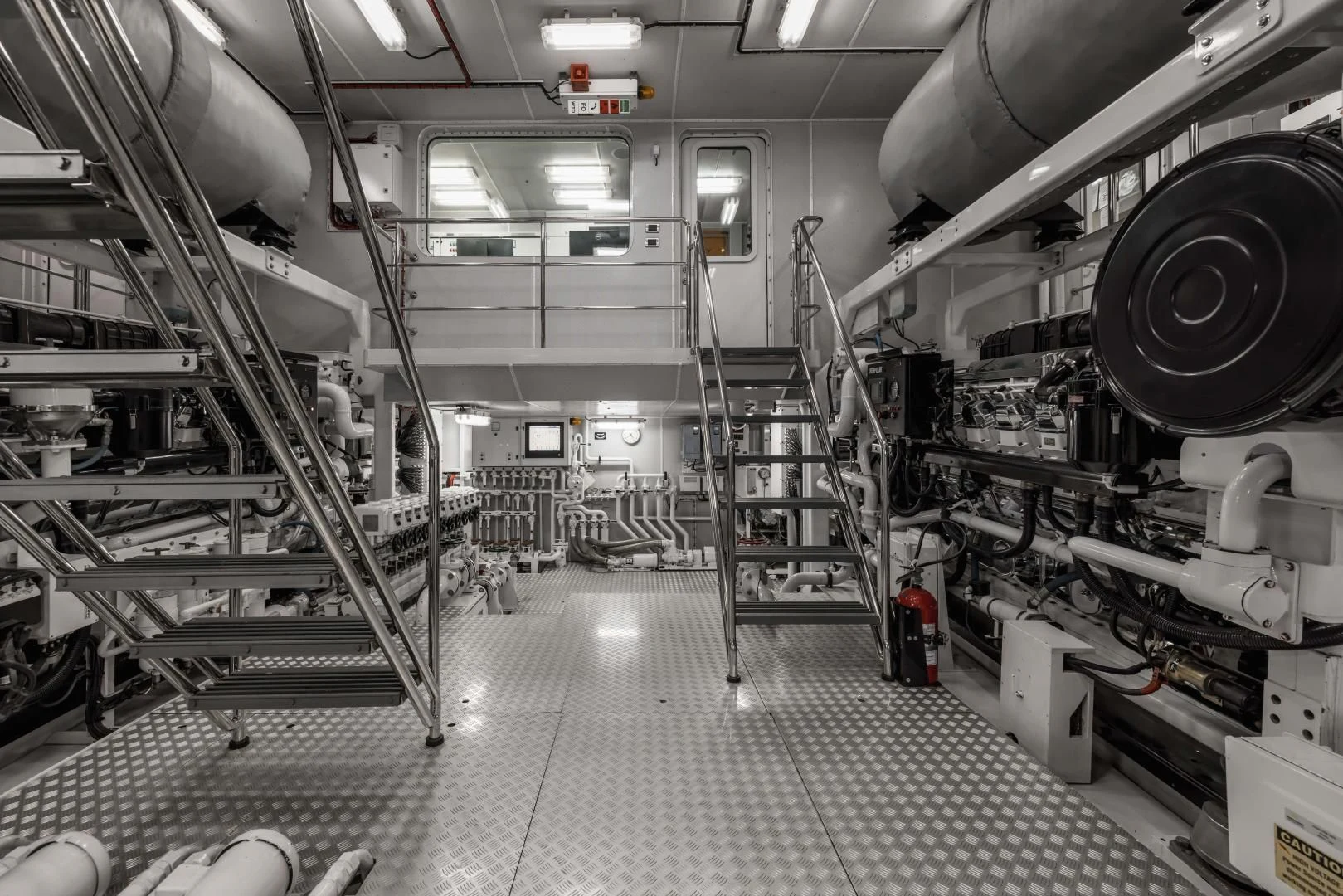 a large room with large machinery aboard LAUREL Yacht for Charter