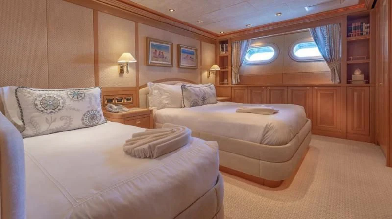 a room with two beds aboard LAUREL Yacht for Charter