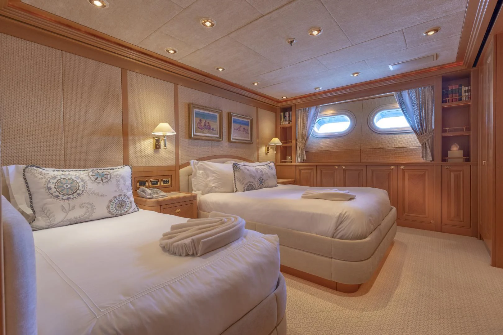 a room with two beds aboard LAUREL Yacht for Charter
