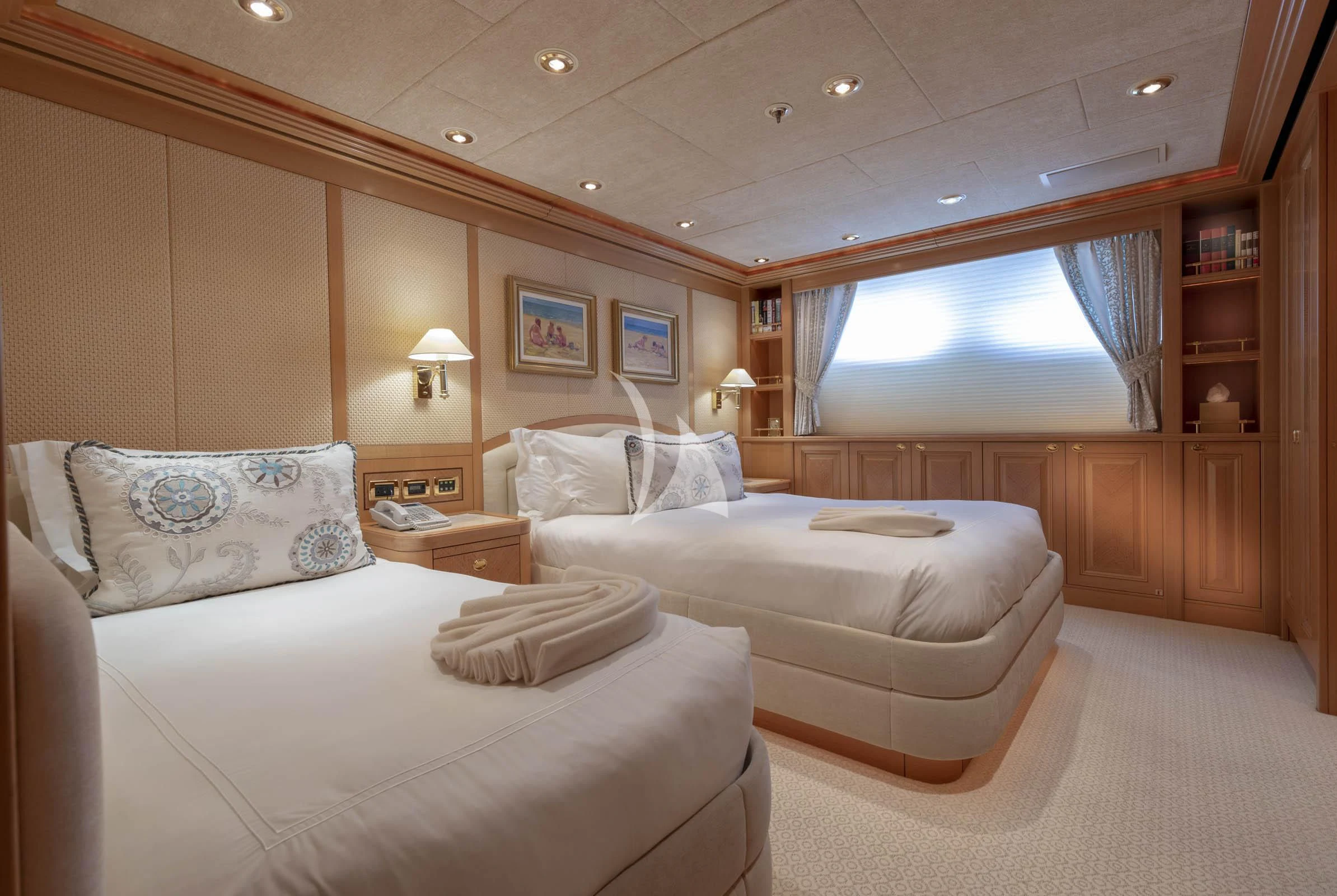 a room with two beds aboard LAUREL Yacht for Charter