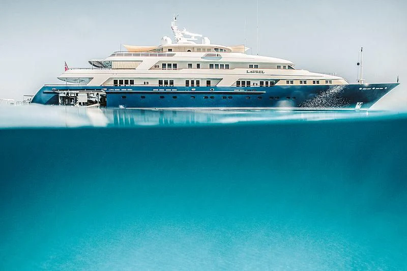 a large cruise ship in the water aboard LAUREL Yacht for Charter