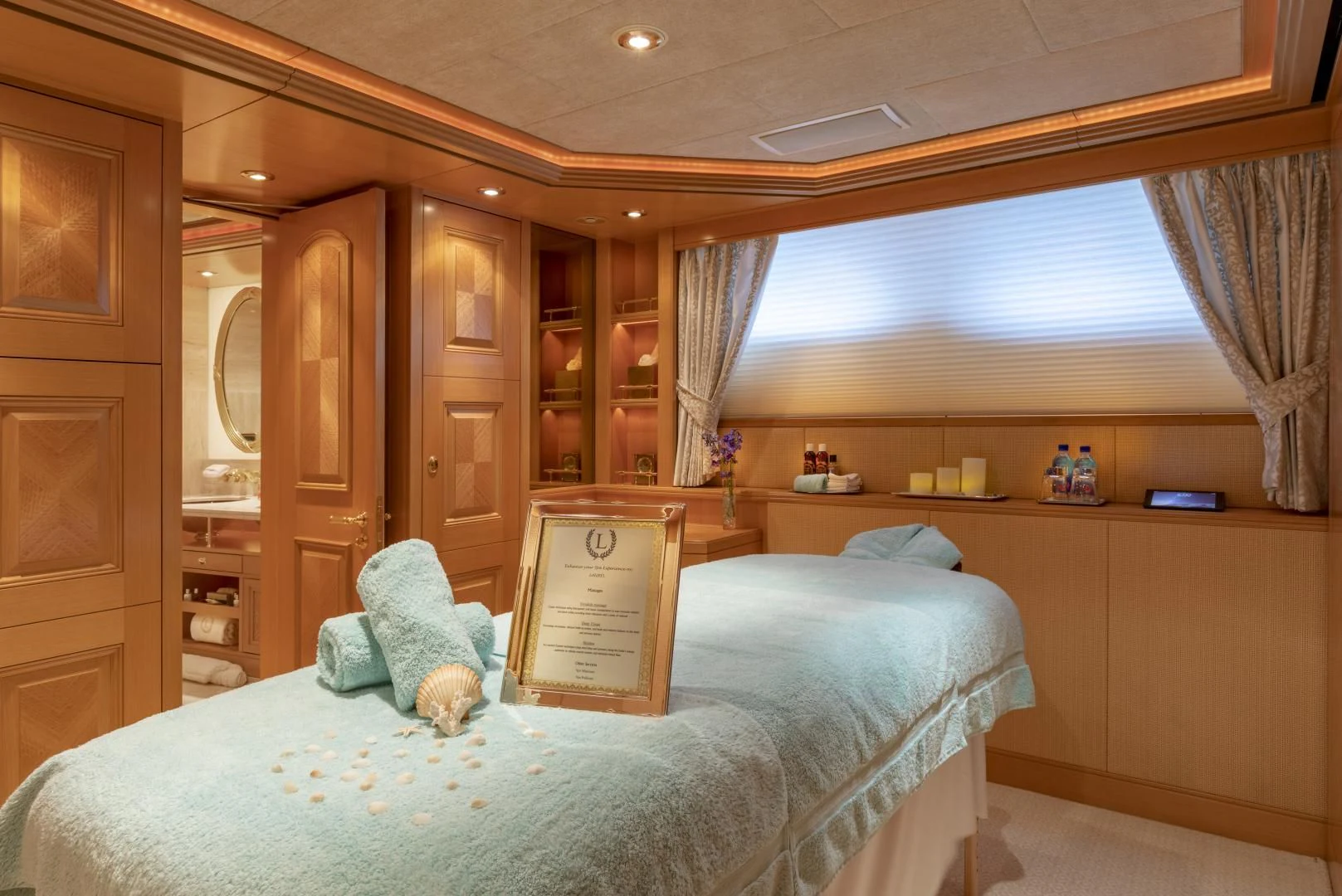 a bed in a room aboard LAUREL Yacht for Charter